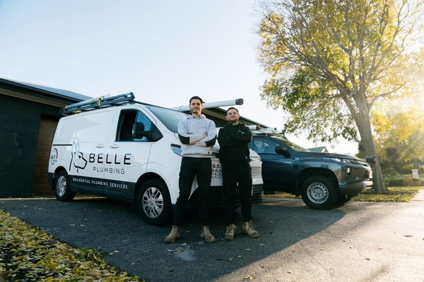 Belle Plumbing plumber unloading gear from the van on site