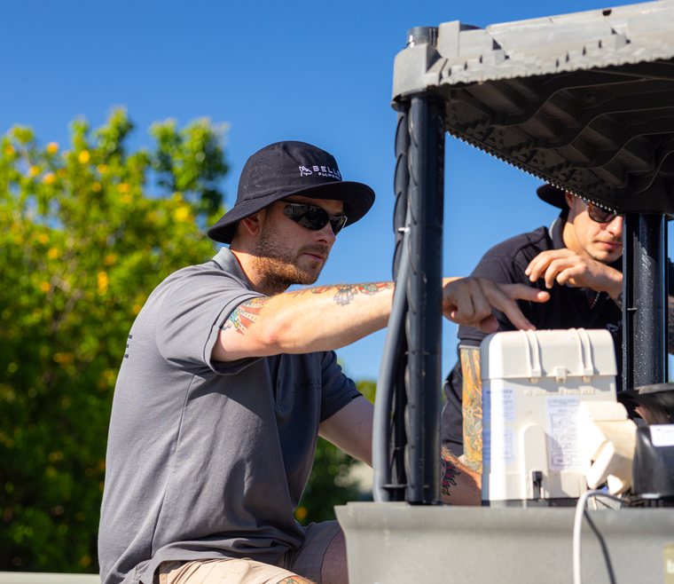 Servicing an open evaporative cooling unit