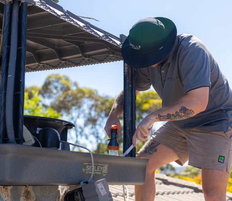 Cleaning an evaporative cooling unit